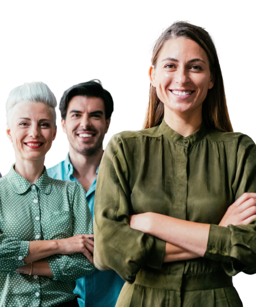 A group of people are standing in a row and smiling directly at the camera. It is clearly a business-related environment.